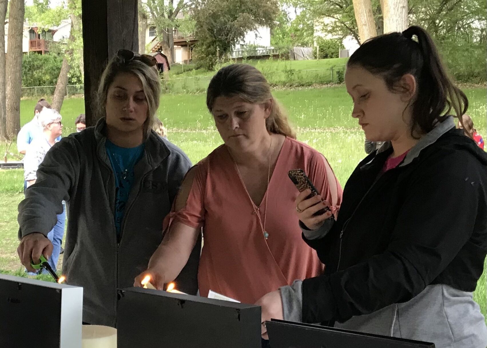 Candlelight vigil for Bellevue children, grieving mother